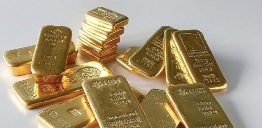 Giá vàng giữ đà phục hồi giữa áp lực từ giá dầu tăng